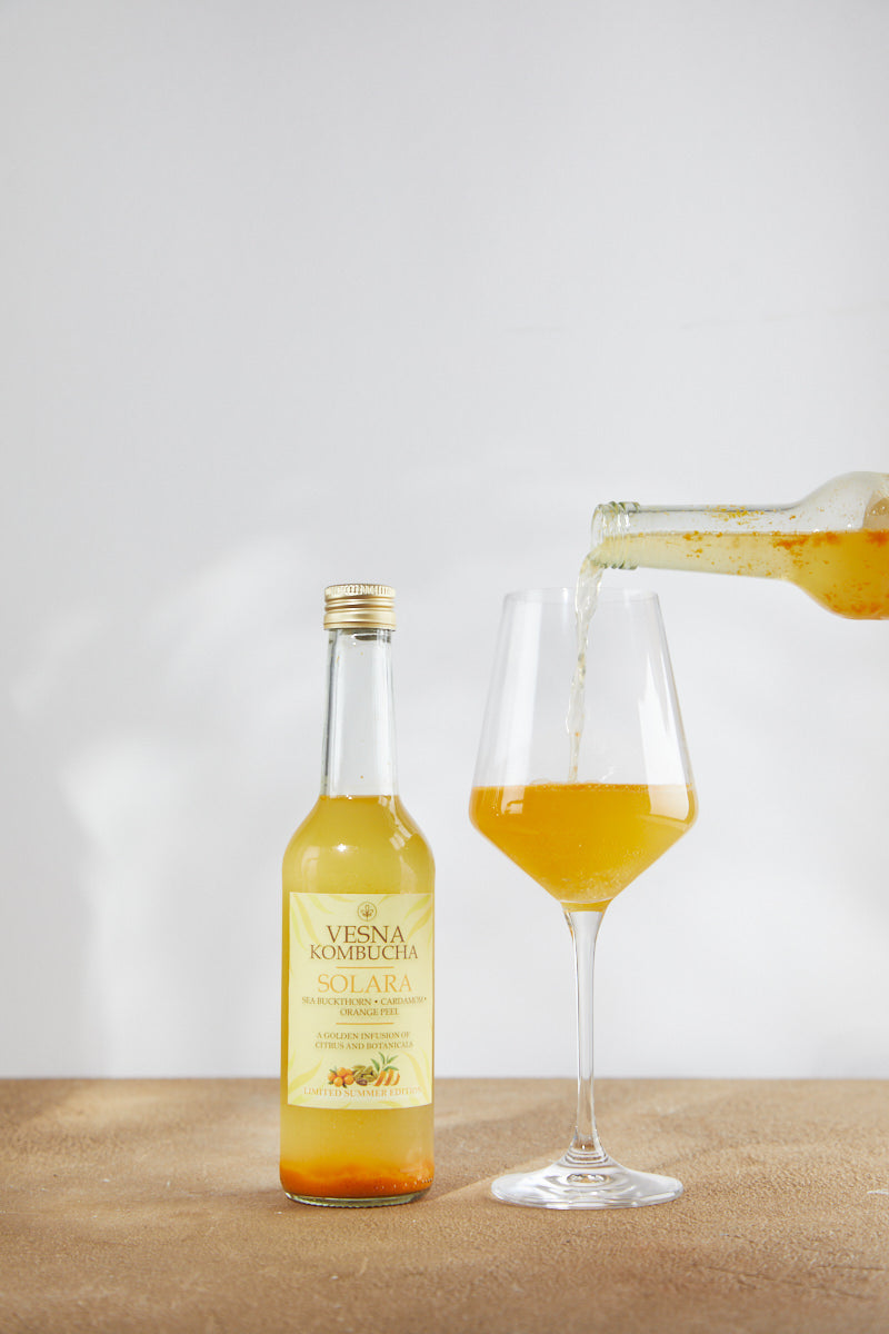Solara limited edition sea buckthorn kombucha bottle with orange peel, chamomile and cardamom.