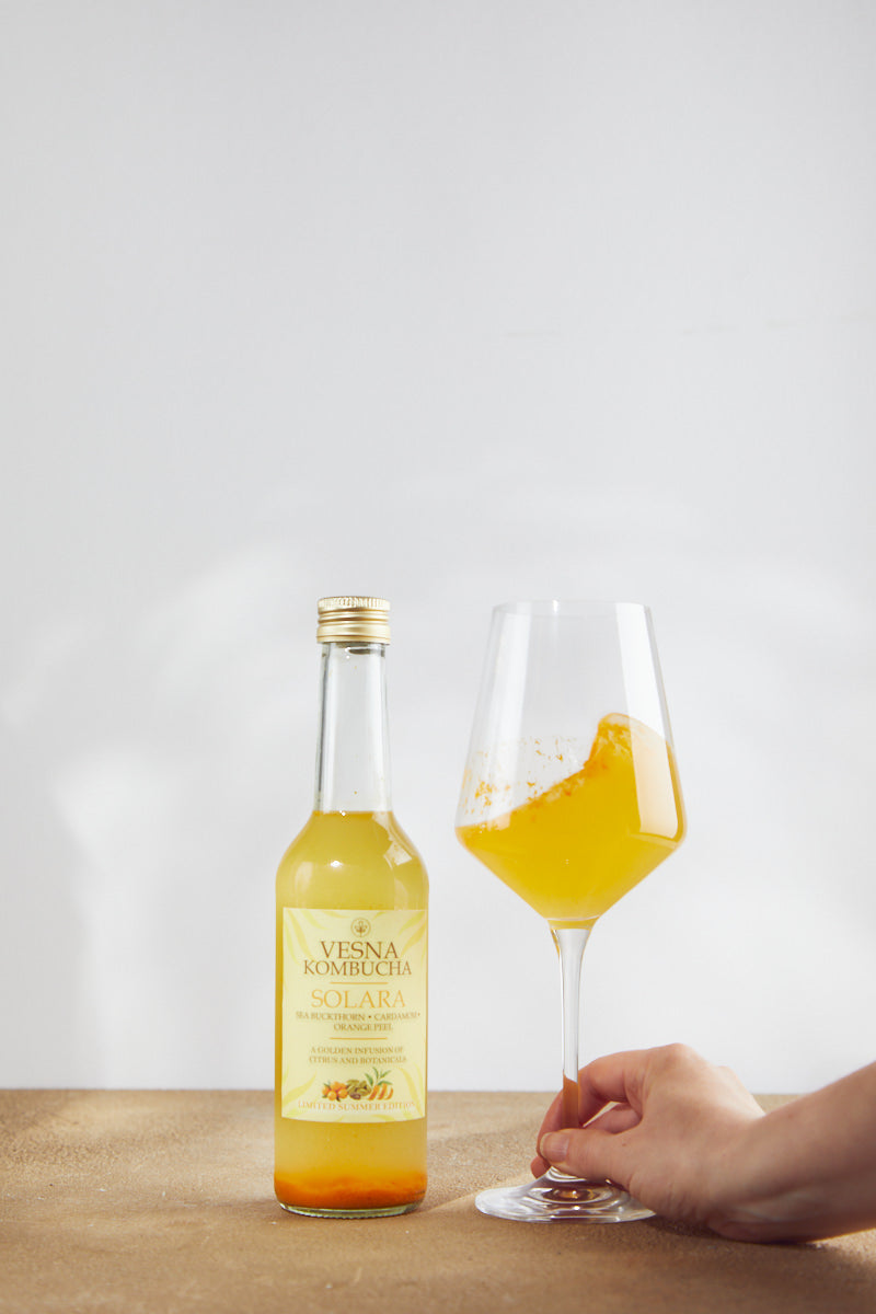Solara limited edition sea buckthorn kombucha bottle with orange peel, chamomile and cardamom