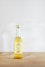 Solara limited edition sea buckthorn kombucha bottle with orange peel, chamomile and cardamom.