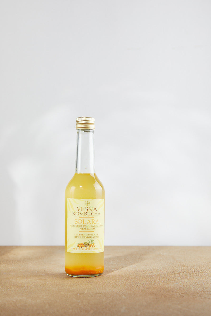 Solara limited edition sea buckthorn kombucha bottle with orange peel, chamomile and cardamom.